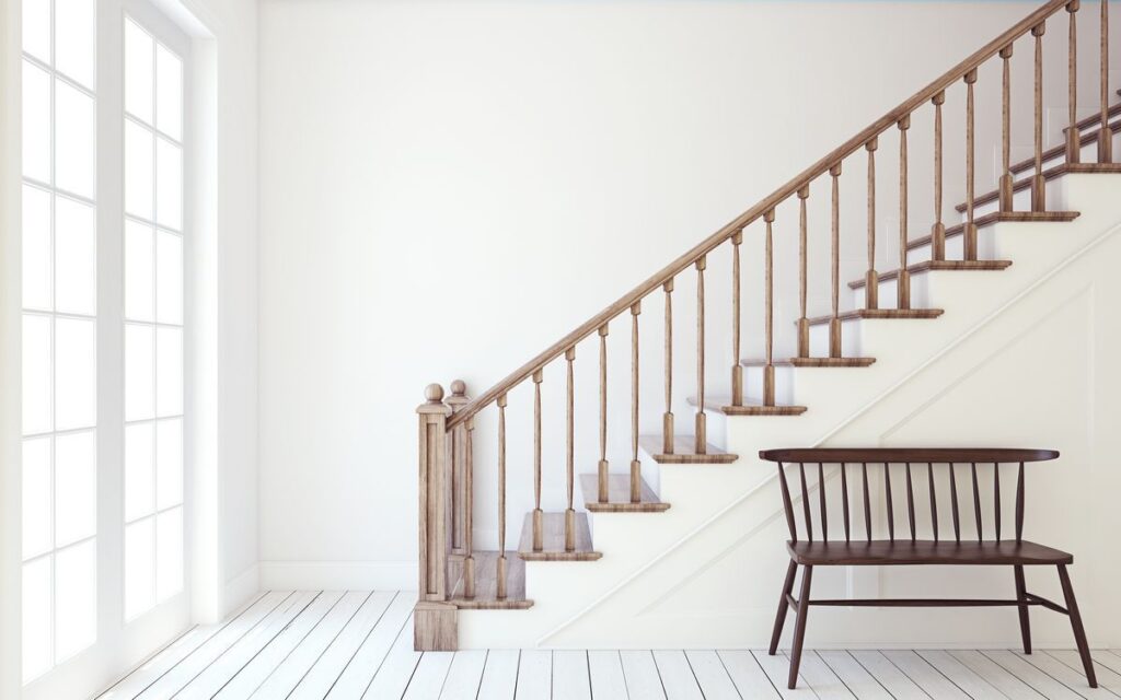 Interior of hallway with wooden staircase