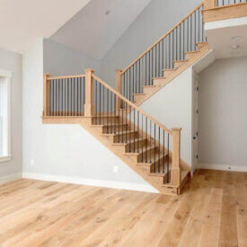 White oak staircase with black iron balusters